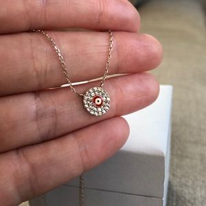 Sterling silver and enamel evil eye necklace.